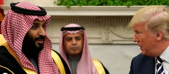 US President Donald Trump speaks with Saudi Crown Prince Mohammed bin Salman during a meeting as the two leaders discuss the US-Saudi civilian nuclear agreement.