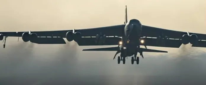 Military bomber aircraft flying at dusk as the Iran UK warning raises concerns over bases used by US forces