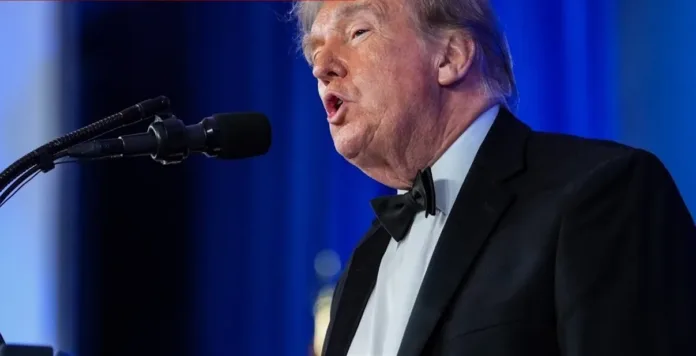 President Donald Trump speaks during the Trump WHCA Dinner, the rescheduled White House Correspondents' Association event following the April shooting
