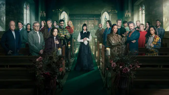 Claudia Winkleman stands in the centre of a candlelit chapel surrounded by the Celebrity Traitors 2026 contestants in the official BBC series two promotional photograph.