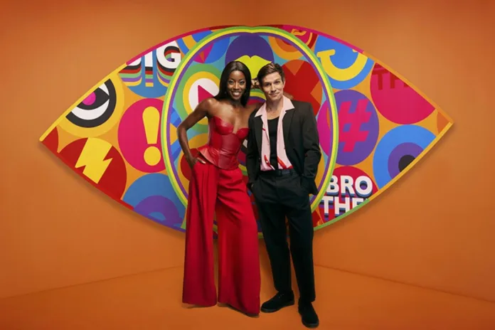 Big Brother 2026 presenters AJ Odudu and Will Best pose together in front of the colourful Big Brother eye logo against an orange background.