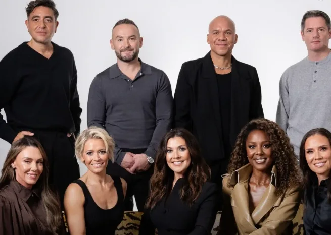 Nine returning members of Hear'Say and Liberty X pose together for their 2027 reunion tour promotional photograph.