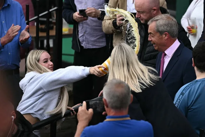 Nigel Farage Struck with Milkshake During Campaign Walkabout