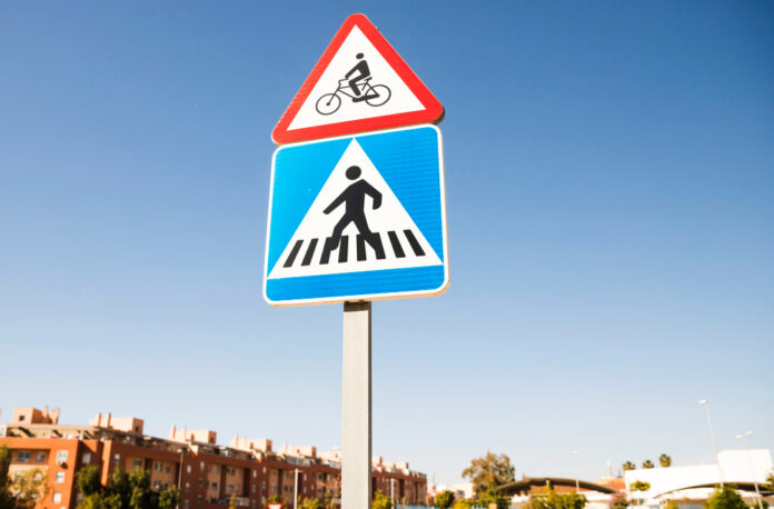 Pedestrian Walking and Cyclist ahead traffic signs